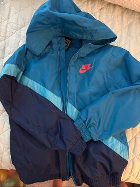 Nike Kids Teal and Navy Colorblock Hooded Raincoat with Pink Logo